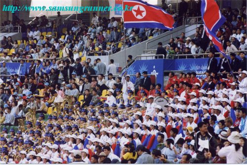 [부산AG] 여자마라톤 경기에 참석한 북한 미녀 응원단 사진